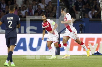 2022-08-28 - Kevin Volland of Monaco celebrates his goal with Wissam Ben Yedder of Monaco (left) during the French championship Ligue 1 football match between Paris Saint-Germain (PSG) and AS Monaco (ASM) on August 28, 2022 at Parc des Princes stadium in Paris, France - FOOTBALL - FRENCH CHAMP - PARIS SG V MONACO - FRENCH LIGUE 1 - SOCCER