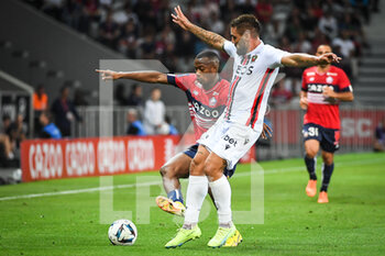 31/08/2022 - Tiago DJALO of Lille and Andy DELORT of Nice during the French championship Ligue 1 football match between LOSC Lille and OGC Nice on August 31, 2022 at Pierre Mauroy stadium in Villeneuve-d'Ascq near Lille, France - FOOTBALL - FRENCH CHAMP - LILLE V NICE - FRENCH LIGUE 1 - CALCIO