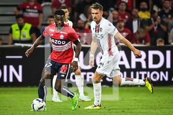 31/08/2022 - Jonathan BAMBA of Lille and Aaron RAMSEY of Nice during the French championship Ligue 1 football match between LOSC Lille and OGC Nice on August 31, 2022 at Pierre Mauroy stadium in Villeneuve-d'Ascq near Lille, France - FOOTBALL - FRENCH CHAMP - LILLE V NICE - FRENCH LIGUE 1 - CALCIO