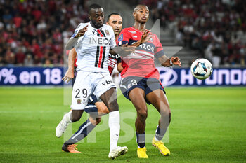 31/08/2022 - Nicolas PEPE of Nice, Ismaily GONCALVES DOS SANTOS of Lille and Tiago DJALO of Lille during the French championship Ligue 1 football match between LOSC Lille and OGC Nice on August 31, 2022 at Pierre Mauroy stadium in Villeneuve-d'Ascq near Lille, France - FOOTBALL - FRENCH CHAMP - LILLE V NICE - FRENCH LIGUE 1 - CALCIO