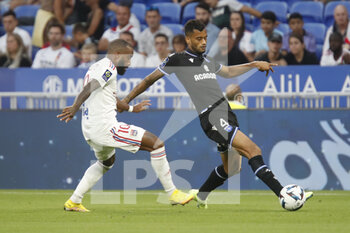 31/08/2022 - Junior ROCHA MENDES of Auverre and Alexandre LACAZETTE of Lyonduring the French championship Ligue 1 football match between Olympique Lyonnais (Lyon) and AJ Auxerre on August 31, 2022 at Groupama stadium in Decines-Charpieu near Lyon, France - FOOTBALL - FRENCH CHAMP - LYON V AUXERRE - FRENCH LIGUE 1 - CALCIO