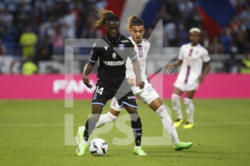 31/08/2022 - Gideon MENSAH of Auxerre and Malo GUSTO of Lyon during the French championship Ligue 1 football match between Olympique Lyonnais (Lyon) and AJ Auxerre on August 31, 2022 at Groupama stadium in Decines-Charpieu near Lyon, France - FOOTBALL - FRENCH CHAMP - LYON V AUXERRE - FRENCH LIGUE 1 - CALCIO