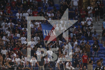 31/08/2022 - Fans of Lyon and flag during the French championship Ligue 1 football match between Olympique Lyonnais (Lyon) and AJ Auxerre on August 31, 2022 at Groupama stadium in Decines-Charpieu near Lyon, France - FOOTBALL - FRENCH CHAMP - LYON V AUXERRE - FRENCH LIGUE 1 - CALCIO