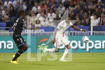 31/08/2022 - Karl TOKO EKAMBI of Lyon and Birama TOURE of Auxerre during the French championship Ligue 1 football match between Olympique Lyonnais (Lyon) and AJ Auxerre on August 31, 2022 at Groupama stadium in Decines-Charpieu near Lyon, France - FOOTBALL - FRENCH CHAMP - LYON V AUXERRE - FRENCH LIGUE 1 - CALCIO