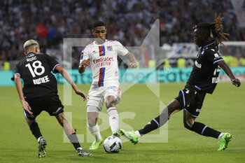 31/08/2022 - Furacao TETE of Lyon and Gideon MENSAH of Auxerre and Kays RUIZ of Auxerre during the French championship Ligue 1 football match between Olympique Lyonnais (Lyon) and AJ Auxerre on August 31, 2022 at Groupama stadium in Decines-Charpieu near Lyon, France - FOOTBALL - FRENCH CHAMP - LYON V AUXERRE - FRENCH LIGUE 1 - CALCIO