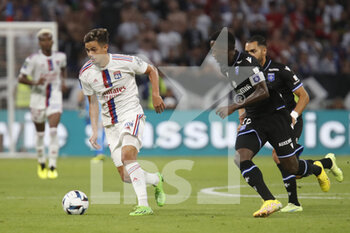 31/08/2022 - Romain FAIVRE of Lyon and Birama TOURE of Auxerre during the French championship Ligue 1 football match between Olympique Lyonnais (Lyon) and AJ Auxerre on August 31, 2022 at Groupama stadium in Decines-Charpieu near Lyon, France - FOOTBALL - FRENCH CHAMP - LYON V AUXERRE - FRENCH LIGUE 1 - CALCIO