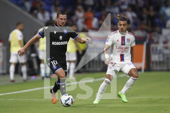31/08/2022 - Gaetan PERRIN of Auxerre and Malo GUSTO of Lyon during the French championship Ligue 1 football match between Olympique Lyonnais (Lyon) and AJ Auxerre on August 31, 2022 at Groupama stadium in Decines-Charpieu near Lyon, France - FOOTBALL - FRENCH CHAMP - LYON V AUXERRE - FRENCH LIGUE 1 - CALCIO