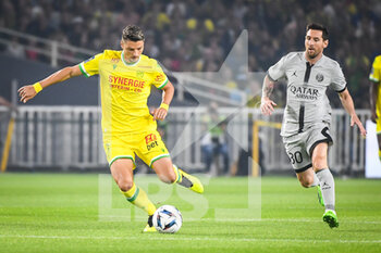 03/09/2022 - Andrei GIROTTO of Nantes and Lionel (Leo) MESSI of PSG during the French championship Ligue 1 football match between FC Nantes and Paris Saint-Germain on September 3, 2022 at La Beaujoire stadium in Nantes, France - FOOTBALL - FRENCH CHAMP - NANTES V PARIS SG - FRENCH LIGUE 1 - CALCIO