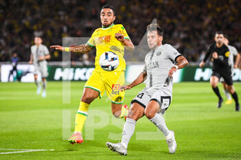 2022-09-03 - Mostafa MOHAMED of Nantes and Juan BERNAT of PSG during the French championship Ligue 1 football match between FC Nantes and Paris Saint-Germain on September 3, 2022 at La Beaujoire stadium in Nantes, France - FOOTBALL - FRENCH CHAMP - NANTES V PARIS SG - FRENCH LIGUE 1 - SOCCER