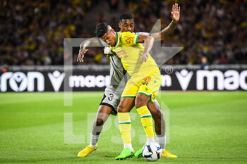 03/09/2022 - Ludovic BLAS of Nantes and Presnel KIMPEMBE of PSG during the French championship Ligue 1 football match between FC Nantes and Paris Saint-Germain on September 3, 2022 at La Beaujoire stadium in Nantes, France - FOOTBALL - FRENCH CHAMP - NANTES V PARIS SG - FRENCH LIGUE 1 - CALCIO