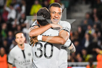 2022-09-03 - Kylian MBAPPE of PSG celebrate his goal with Lionel (Leo) MESSI of PSG during the French championship Ligue 1 football match between FC Nantes and Paris Saint-Germain on September 3, 2022 at La Beaujoire stadium in Nantes, France - FOOTBALL - FRENCH CHAMP - NANTES V PARIS SG - FRENCH LIGUE 1 - SOCCER
