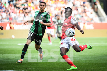 2022-09-04 - Przemyslaw Adam FRANKOWSKI of Lens and Banzouzi (Bradley) LOCKO of Reims during the French championship Ligue 1 football match between Stade de Reims and RC Lens on September 4, 2022 at Auguste Delaune stadium in Reims, France - FOOTBALL - FRENCH CHAMP - REIMS V LENS - FRENCH LIGUE 1 - SOCCER