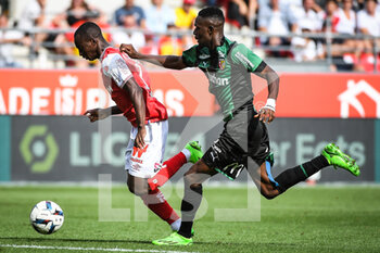 2022-09-04 - Kamory DOUMBIA of Reims and Salis ABDUL SAMED of Lens during the French championship Ligue 1 football match between Stade de Reims and RC Lens on September 4, 2022 at Auguste Delaune stadium in Reims, France - FOOTBALL - FRENCH CHAMP - REIMS V LENS - FRENCH LIGUE 1 - SOCCER