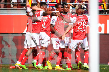 2022-09-04 - Folarin BALOGUN of Reims celebrate his goal with teammates during the French championship Ligue 1 football match between Stade de Reims and RC Lens on September 4, 2022 at Auguste Delaune stadium in Reims, France - FOOTBALL - FRENCH CHAMP - REIMS V LENS - FRENCH LIGUE 1 - SOCCER
