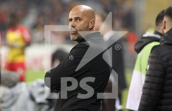 2022-10-02 - Coach of Olympique Lyonnais Peter Bosz during the French championship Ligue 1 football match between RC Lens (RCL) and Olympique Lyonnais (OL, Lyon) on October 2, 2022 at Stade Bollaert-Delelis in Lens, France - FOOTBALL - FRENCH CHAMP - LENS V LYON - FRENCH LIGUE 1 - SOCCER