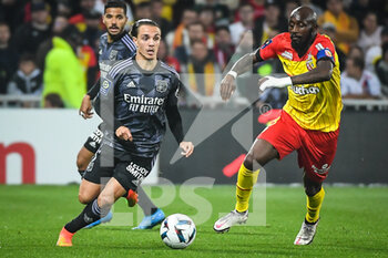 2022-10-02 - Maxence CAQUERET of Lyon and Seko FOFANA of Lens during the French championship Ligue 1 football match between RC Lens and Olympique Lyonnais (Lyon) on October 2, 2022 at Bollaert-Delelis stadium in Lens, France - FOOTBALL - FRENCH CHAMP - LENS V LYON - FRENCH LIGUE 1 - SOCCER