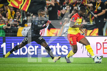 2022-10-02 - Alexandre LACAZETTE of Lyon and Kevin DANSO of Lens during the French championship Ligue 1 football match between RC Lens and Olympique Lyonnais (Lyon) on October 2, 2022 at Bollaert-Delelis stadium in Lens, France - FOOTBALL - FRENCH CHAMP - LENS V LYON - FRENCH LIGUE 1 - SOCCER