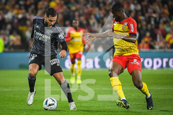 2022-10-02 - Rayan CHERKI of Lyon and Kevin DANSO of Lens during the French championship Ligue 1 football match between RC Lens and Olympique Lyonnais (Lyon) on October 2, 2022 at Bollaert-Delelis stadium in Lens, France - FOOTBALL - FRENCH CHAMP - LENS V LYON - FRENCH LIGUE 1 - SOCCER
