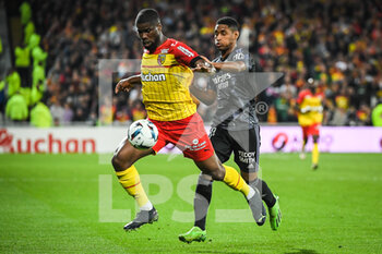 2022-10-02 - Kevin DANSO of Lens and Tete of Lyon during the French championship Ligue 1 football match between RC Lens and Olympique Lyonnais (Lyon) on October 2, 2022 at Bollaert-Delelis stadium in Lens, France - FOOTBALL - FRENCH CHAMP - LENS V LYON - FRENCH LIGUE 1 - SOCCER