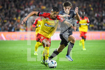 2022-10-02 - Florian SOTOCA of Lens and Johann LEPENANT of Lyon during the French championship Ligue 1 football match between RC Lens and Olympique Lyonnais (Lyon) on October 2, 2022 at Bollaert-Delelis stadium in Lens, France - FOOTBALL - FRENCH CHAMP - LENS V LYON - FRENCH LIGUE 1 - SOCCER