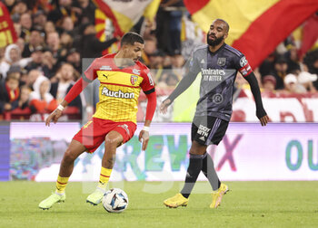 2022-10-02 - Facundo Medina of Lens, Alexandre Lacazette of Lyon during the French championship Ligue 1 football match between RC Lens (RCL) and Olympique Lyonnais (OL, Lyon) on October 2, 2022 at Stade Bollaert-Delelis in Lens, France - FOOTBALL - FRENCH CHAMP - LENS V LYON - FRENCH LIGUE 1 - SOCCER