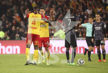 2022-10-02 - Florian Sotoca of Lens celebrates his goal with Kevin Danso of Lens during the French championship Ligue 1 football match between RC Lens (RCL) and Olympique Lyonnais (OL, Lyon) on October 2, 2022 at Stade Bollaert-Delelis in Lens, France - FOOTBALL - FRENCH CHAMP - LENS V LYON - FRENCH LIGUE 1 - SOCCER