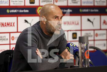 2022-10-02 - Coach of Olympique Lyonnais Peter Bosz answers to the media during the post-match press conference following the French championship Ligue 1 football match between RC Lens (RCL) and Olympique Lyonnais (OL, Lyon) on October 2, 2022 at Stade Bollaert-Delelis in Lens, France - FOOTBALL - FRENCH CHAMP - LENS V LYON - FRENCH LIGUE 1 - SOCCER