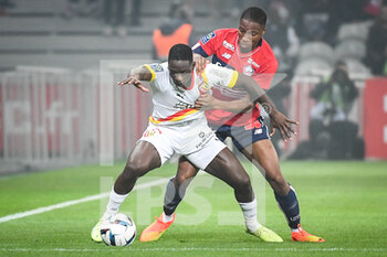 09/10/2022 - Deiver MACHADO of Lens and Bafode DIAKITE of Lille during the French championship Ligue 1 football match between LOSC Lille and RC Lens on October 9, 2022 at Pierre Mauroy stadium in Villeneuve-d'Ascq near Lille, France - FOOTBALL - FRENCH CHAMP - LILLE V LENS - FRENCH LIGUE 1 - CALCIO
