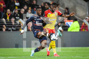 2022-10-15 - Elye WAHI of Montpellier and Kevin DANSO of Lens during the French championship Ligue 1 football match between RC Lens and Montpellier HSC on October 15, 2022 at Bollaert-Delelis stadium in Lens, France - FOOTBALL - FRENCH CHAMP - LENS V MONTPELLIER - FRENCH LIGUE 1 - SOCCER