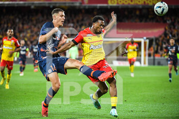15/10/2022 - Maxime ESTEVE of Montpellier and Lois OPENDA of Lens during the French championship Ligue 1 football match between RC Lens and Montpellier HSC on October 15, 2022 at Bollaert-Delelis stadium in Lens, France - FOOTBALL - FRENCH CHAMP - LENS V MONTPELLIER - FRENCH LIGUE 1 - CALCIO
