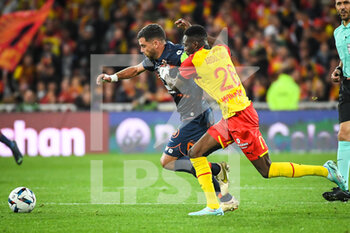 2022-10-15 - Teji SAVANIER of Montpellier and Salis ABDUL SAMED of Lens during the French championship Ligue 1 football match between RC Lens and Montpellier HSC on October 15, 2022 at Bollaert-Delelis stadium in Lens, France - FOOTBALL - FRENCH CHAMP - LENS V MONTPELLIER - FRENCH LIGUE 1 - SOCCER