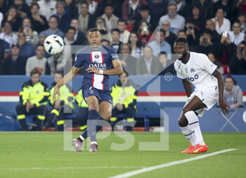2022-10-16 - Kylian Mbappe of PSG, Chancel Mbemba of Marseille during the French championship Ligue 1 football match between Paris Saint-Germain (PSG) and Olympique de Marseille (OM) on October 16, 2022 at Parc des Princes stadium in Paris, France - FOOTBALL - FRENCH CHAMP - PARIS SG V MARSEILLE - FRENCH LIGUE 1 - SOCCER
