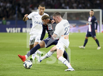 2022-10-16 - Neymar Jr of PSG, Amine Harit and Jordan Veretout of Marseille during the French championship Ligue 1 football match between Paris Saint-Germain (PSG) and Olympique de Marseille (OM) on October 16, 2022 at Parc des Princes stadium in Paris, France - FOOTBALL - FRENCH CHAMP - PARIS SG V MARSEILLE - FRENCH LIGUE 1 - SOCCER