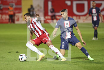 21/10/2022 - Youcef Belaili of Ajaccio, Achraf Hakimi of PSG during the French championship Ligue 1 football match between AC Ajaccio (ACA) and Paris Saint-Germain (PSG on October 21, 2022 at Stade Francois Coty in Ajaccio, France - FOOTBALL - FRENCH CHAMP - AJACCIO V PARIS SG - FRENCH LIGUE 1 - CALCIO
