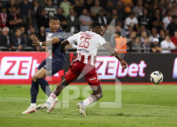 21/10/2022 - Kylian Mbappe of PSG, Oumar Gonzalez of Ajaccio during the French championship Ligue 1 football match between AC Ajaccio (ACA) and Paris Saint-Germain (PSG on October 21, 2022 at Stade Francois Coty in Ajaccio, France - FOOTBALL - FRENCH CHAMP - AJACCIO V PARIS SG - FRENCH LIGUE 1 - CALCIO