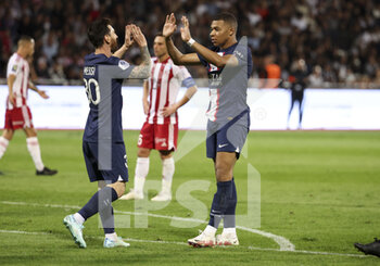 21/10/2022 - Kylian Mbappe of PSG celebrates his second goal with Lionel Messi (left) during the French championship Ligue 1 football match between AC Ajaccio (ACA) and Paris Saint-Germain (PSG on October 21, 2022 at Stade Francois Coty in Ajaccio, France - FOOTBALL - FRENCH CHAMP - AJACCIO V PARIS SG - FRENCH LIGUE 1 - CALCIO