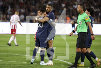 21/10/2022 - Kylian Mbappe of PSG celebrates his second goal with Lionel Messi (left) during the French championship Ligue 1 football match between AC Ajaccio (ACA) and Paris Saint-Germain (PSG on October 21, 2022 at Stade Francois Coty in Ajaccio, France - FOOTBALL - FRENCH CHAMP - AJACCIO V PARIS SG - FRENCH LIGUE 1 - CALCIO