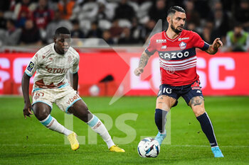 2022-10-23 - Eliot MATAZO of Monaco and Remy CABELLA of Lille during the French championship Ligue 1 football match between LOSC Lille and AS Monaco on October 23, 2022 at Pierre Mauroy stadium in Villeneuve-d'Ascq near Lille, France - FOOTBALL - FRENCH CHAMP - LILLE V MONACO - FRENCH LIGUE 1 - SOCCER