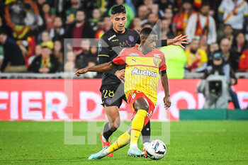 28/10/2022 - Fares CHAIBI of Toulouse and David PEREIRA DA COSTA of Lens during the French championship Ligue 1 football match between RC Lens and Toulouse FC on October 28, 2022 at Bollaert-Delelis stadium in Lens, France - FOOTBALL - FRENCH CHAMP - LENS V TOULOUSE - FRENCH LIGUE 1 - CALCIO