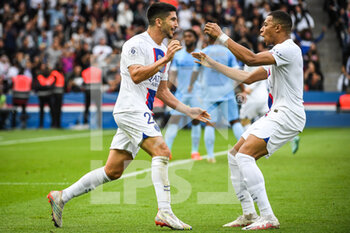 2022-10-29 - Carlos SOLER of PSG celebrate his goal with Kylian MBAPPE of PSG during the French championship Ligue 1 football match between Paris Saint-Germain and ESTAC Troyes on October 29, 2022 at Parc des Princes stadium in Paris, France - FOOTBALL - FRENCH CHAMP - PARIS SG V TROYES - FRENCH LIGUE 1 - SOCCER