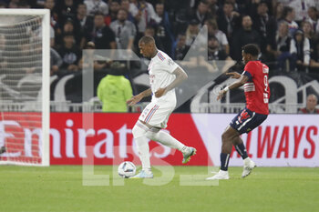 2022-10-30 - Jerome BOATENG of Lyon and Jonathan DAVID of Lille during the French championship Ligue 1 football match between Olympique Lyonnais (Lyon) and LOSC Lille on October 30, 2022 at Groupama stadium in Decines-Charpieu near Lyon, France - FOOTBALL - FRENCH CHAMP - LYON V LILLE - FRENCH LIGUE 1 - SOCCER