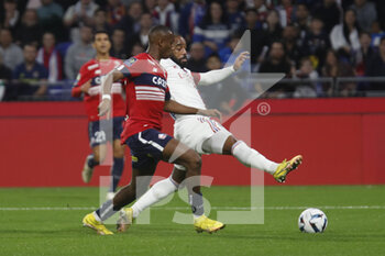 2022-10-30 - Alexandre LACAZETTE of Lyon and Tiago EMBALO DJALO of Lille during the French championship Ligue 1 football match between Olympique Lyonnais (Lyon) and LOSC Lille on October 30, 2022 at Groupama stadium in Decines-Charpieu near Lyon, France - FOOTBALL - FRENCH CHAMP - LYON V LILLE - FRENCH LIGUE 1 - SOCCER