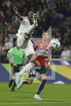 2022-10-30 - Moussa DEMBELE of Lyon and Jose DA ROCHA FONTE of Lille during the French championship Ligue 1 football match between Olympique Lyonnais (Lyon) and LOSC Lille on October 30, 2022 at Groupama stadium in Decines-Charpieu near Lyon, France - FOOTBALL - FRENCH CHAMP - LYON V LILLE - FRENCH LIGUE 1 - SOCCER