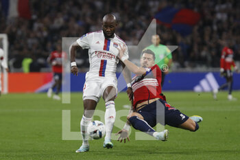 2022-10-30 - Moussa DEMBELE of Lyon and Jose DA ROCHA FONTE of Lille during the French championship Ligue 1 football match between Olympique Lyonnais (Lyon) and LOSC Lille on October 30, 2022 at Groupama stadium in Decines-Charpieu near Lyon, France - FOOTBALL - FRENCH CHAMP - LYON V LILLE - FRENCH LIGUE 1 - SOCCER