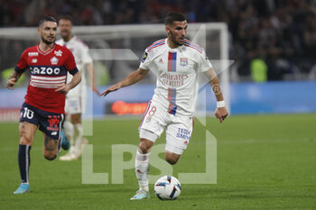 2022-10-30 - Houssem AOUAR of Lyon and Remy CABELLA of Lille during the French championship Ligue 1 football match between Olympique Lyonnais (Lyon) and LOSC Lille on October 30, 2022 at Groupama stadium in Decines-Charpieu near Lyon, France - FOOTBALL - FRENCH CHAMP - LYON V LILLE - FRENCH LIGUE 1 - SOCCER