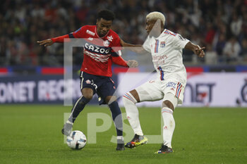 2022-10-30 - Adilson GOMES of Lille and Thiago MENDES of Lyon during the French championship Ligue 1 football match between Olympique Lyonnais (Lyon) and LOSC Lille on October 30, 2022 at Groupama stadium in Decines-Charpieu near Lyon, France - FOOTBALL - FRENCH CHAMP - LYON V LILLE - FRENCH LIGUE 1 - SOCCER
