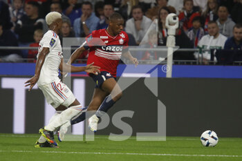 2022-10-30 - Bafode DIAKITE of Lille and Thiago MENDES of Lyon during the French championship Ligue 1 football match between Olympique Lyonnais (Lyon) and LOSC Lille on October 30, 2022 at Groupama stadium in Decines-Charpieu near Lyon, France - FOOTBALL - FRENCH CHAMP - LYON V LILLE - FRENCH LIGUE 1 - SOCCER