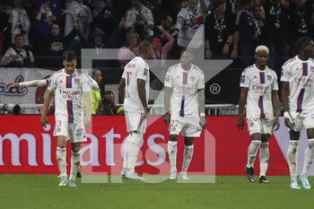 2022-10-30 - Alexandre LACAZETTE of Lyon celebrate score a goal and Jerome BOATENG of Lyon and Jeff REINE ADELAIDE of Lyon during the French championship Ligue 1 football match between Olympique Lyonnais (Lyon) and LOSC Lille on October 30, 2022 at Groupama stadium in Decines-Charpieu near Lyon, France - FOOTBALL - FRENCH CHAMP - LYON V LILLE - FRENCH LIGUE 1 - SOCCER