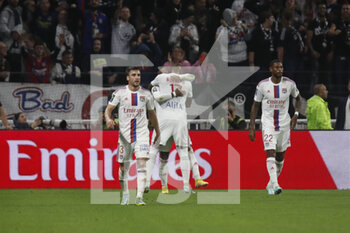 2022-10-30 - Alexandre LACAZETTE of Lyon celebrate score a goal and Jerome BOATENG of Lyon during the French championship Ligue 1 football match between Olympique Lyonnais (Lyon) and LOSC Lille on October 30, 2022 at Groupama stadium in Decines-Charpieu near Lyon, France - FOOTBALL - FRENCH CHAMP - LYON V LILLE - FRENCH LIGUE 1 - SOCCER