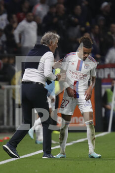 2022-10-30 - Laurent BLANC coach of Lyon and Malo GUSTO of Lyon during the French championship Ligue 1 football match between Olympique Lyonnais (Lyon) and LOSC Lille on October 30, 2022 at Groupama stadium in Decines-Charpieu near Lyon, France - FOOTBALL - FRENCH CHAMP - LYON V LILLE - FRENCH LIGUE 1 - SOCCER
